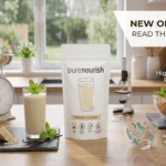 ureNourish Partner.co functional shake prepared with berries and plant milk in an elegant glass